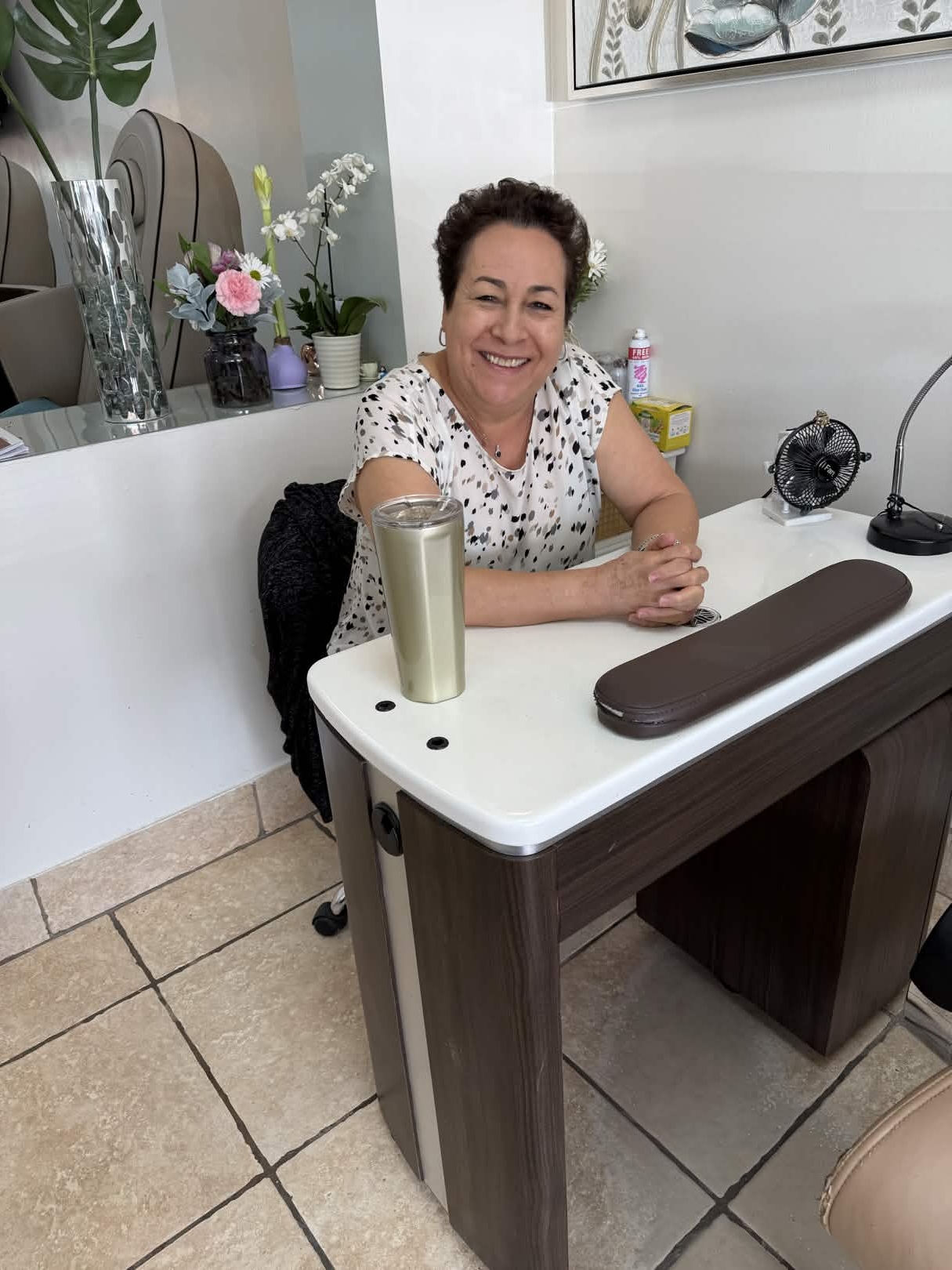 Gloria Flores, La Patrona, at her manicure station inside Nails Labelle in Dallas
